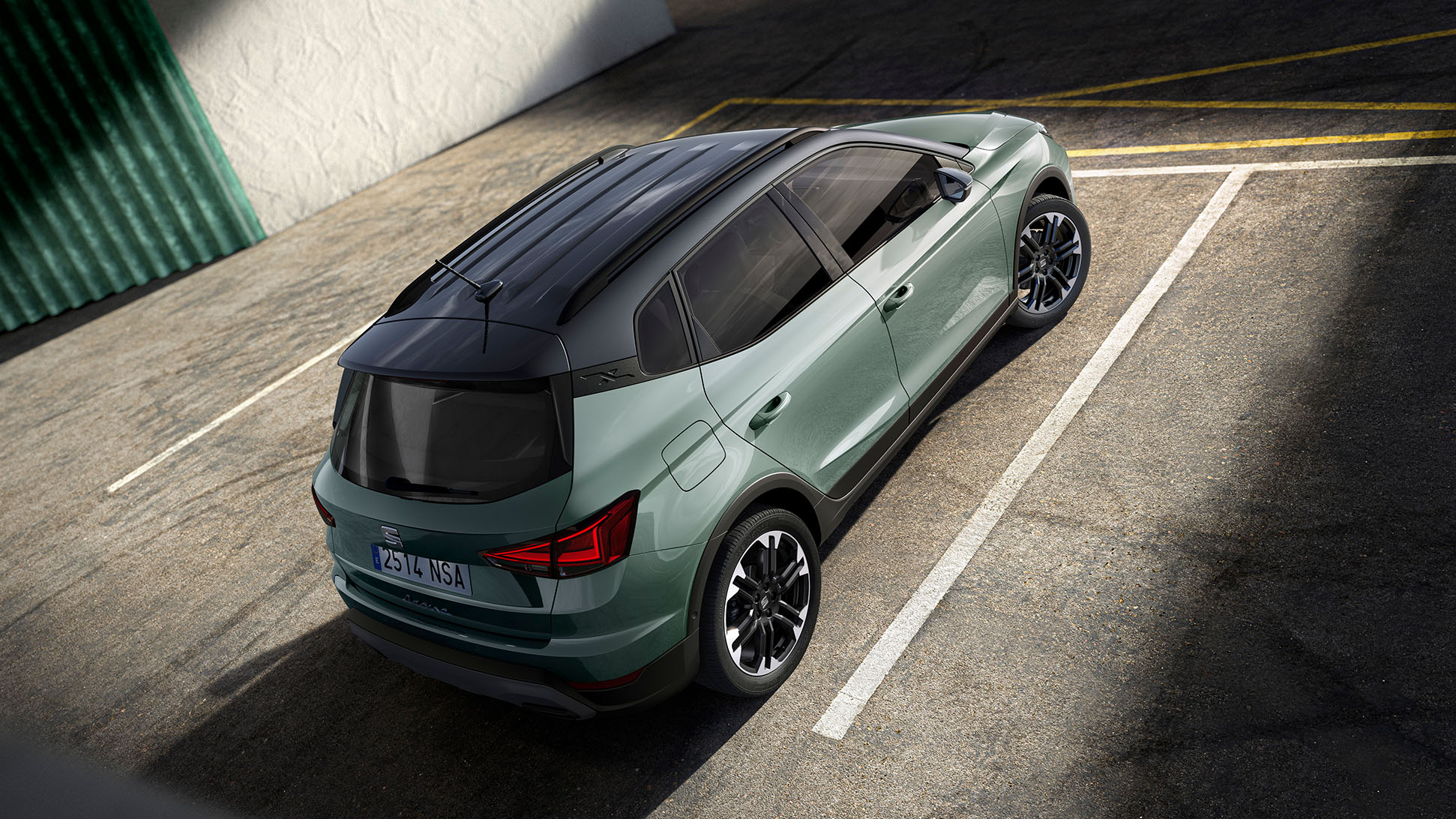 Rear side view of the SEAT Arona showcasing its impeccable compact crossover SUV design Rear side view of the SEAT Arona showcasing its impeccable compact crossover SUV design