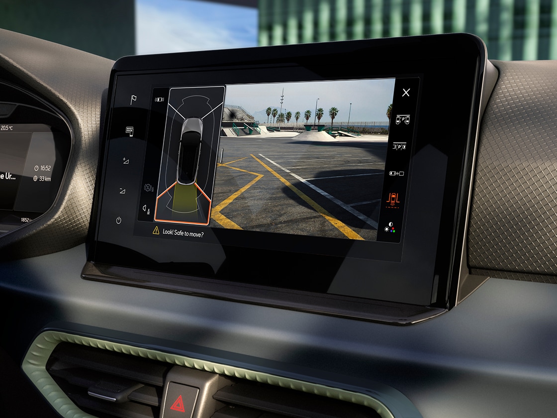 SEAT Arona vision pack to improve vision and assistance. The shot showcases the touchscreen from the interior of the car SEAT Arona vision pack to improve vision and assistance. The shot showcases the touchscreen from the interior of the car