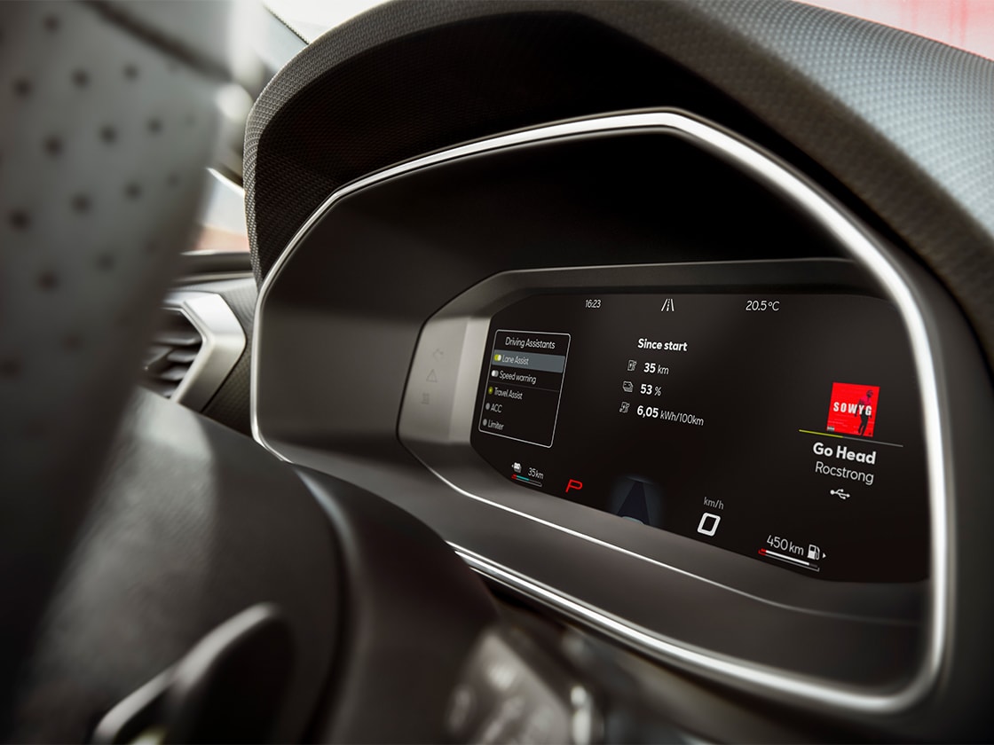 Interior view of the seat leon 2025's digital dashboard, compatible with wireless apple carplay and carplay android auto, allong with lane assist and advanced driving aids.