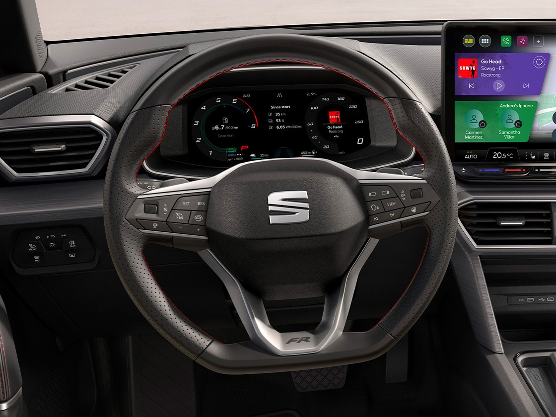 Driver seated in the seat leon with a heated steering wheel, part of the winter pack, designed to handle the coldest temperatures head-on with heated front seats and climate control.