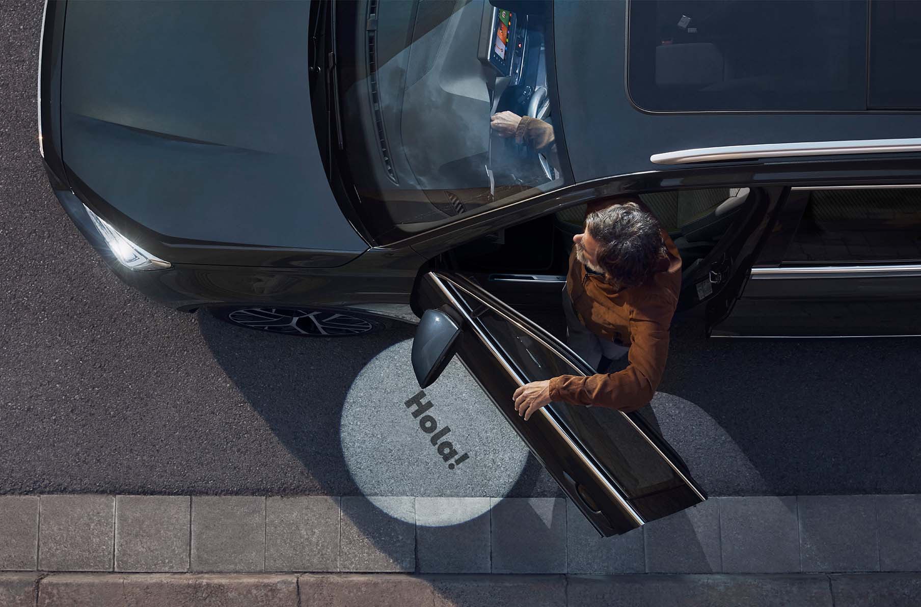 Drone view of a man entering the  SEAT Tarraco XPERIENCE