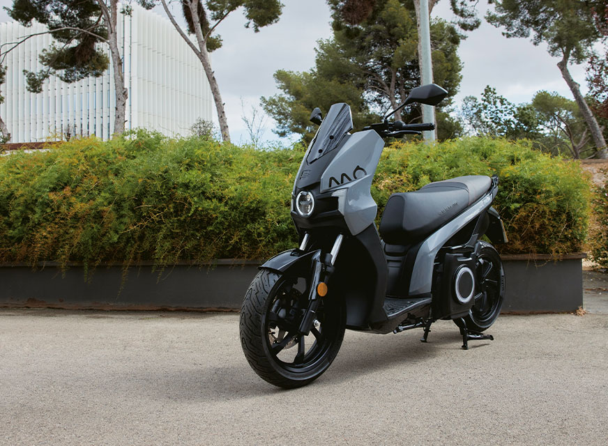 SEAT MO 50 electric scooter parked on the park
