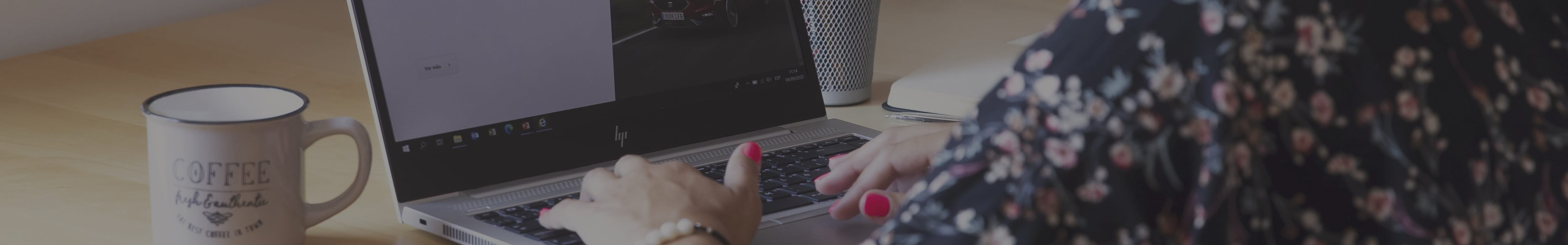 woman typing on laptop