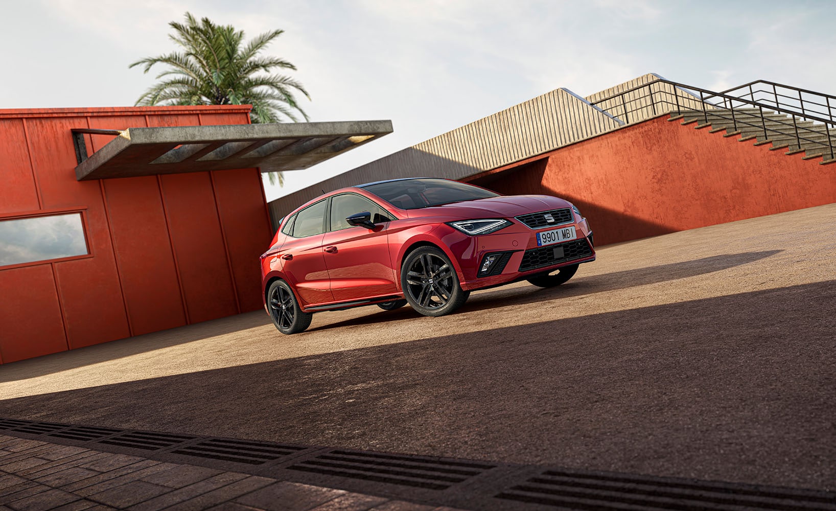 Front exterior view of the SEAT Ibiza Black Pack Edition, showcasing the vehicle’s black side skirts and black roof spoiler, emphasizing its distinctive and sporty appearance.