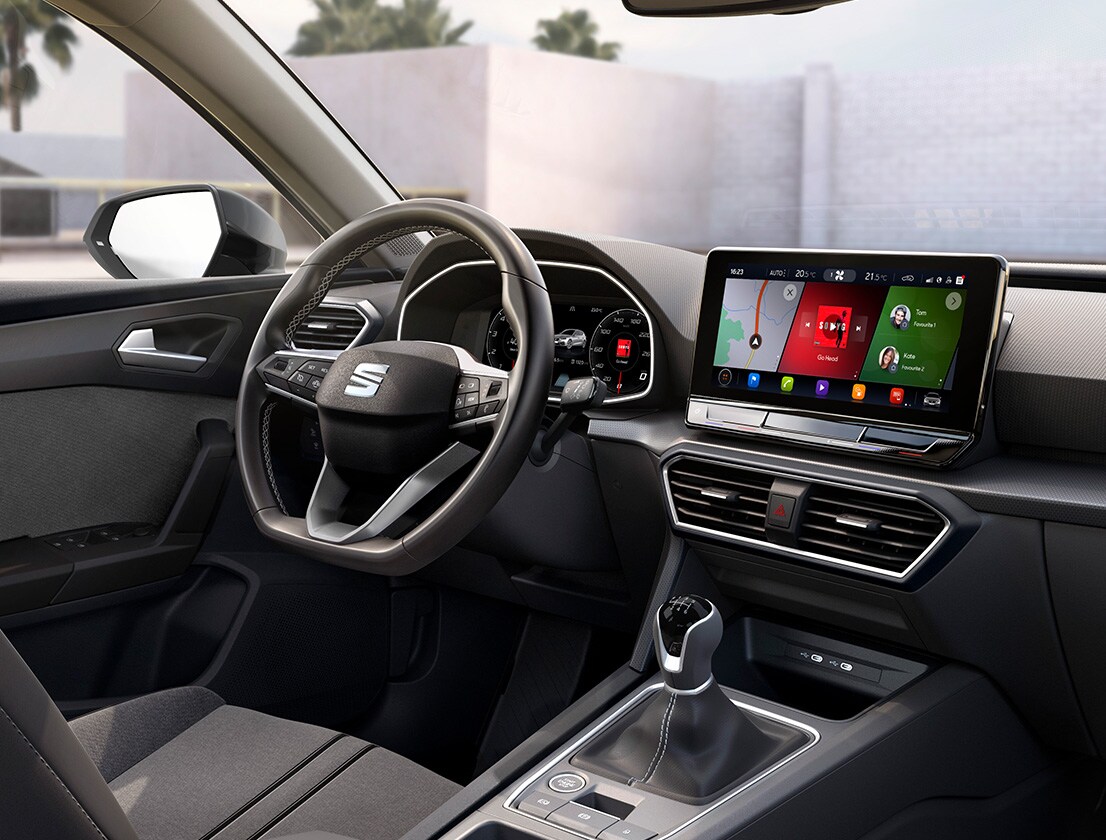 sseat leon interior view of the steering wheel and infotainment screen