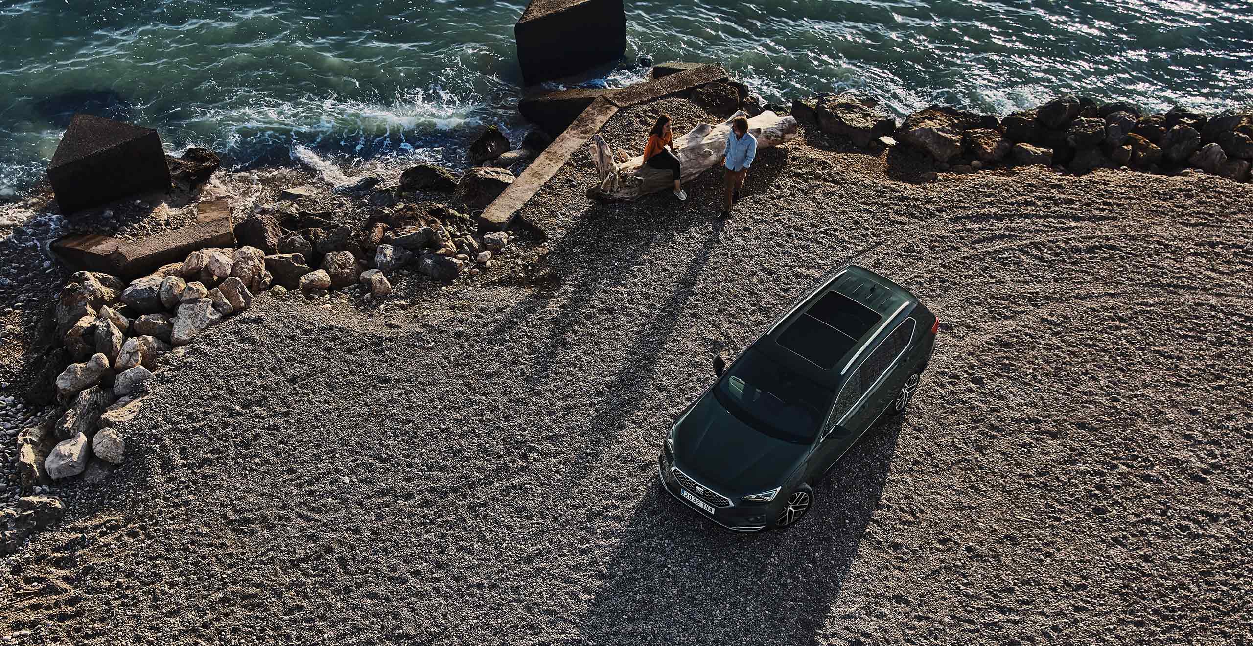 drone view of a beach with a seat ateca 