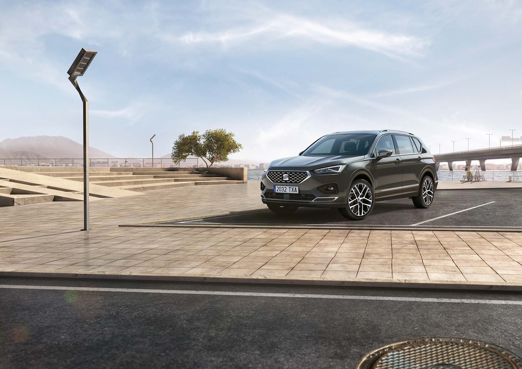 SEAT Tarraco Dark Camouflage colour front view in a parking lot 