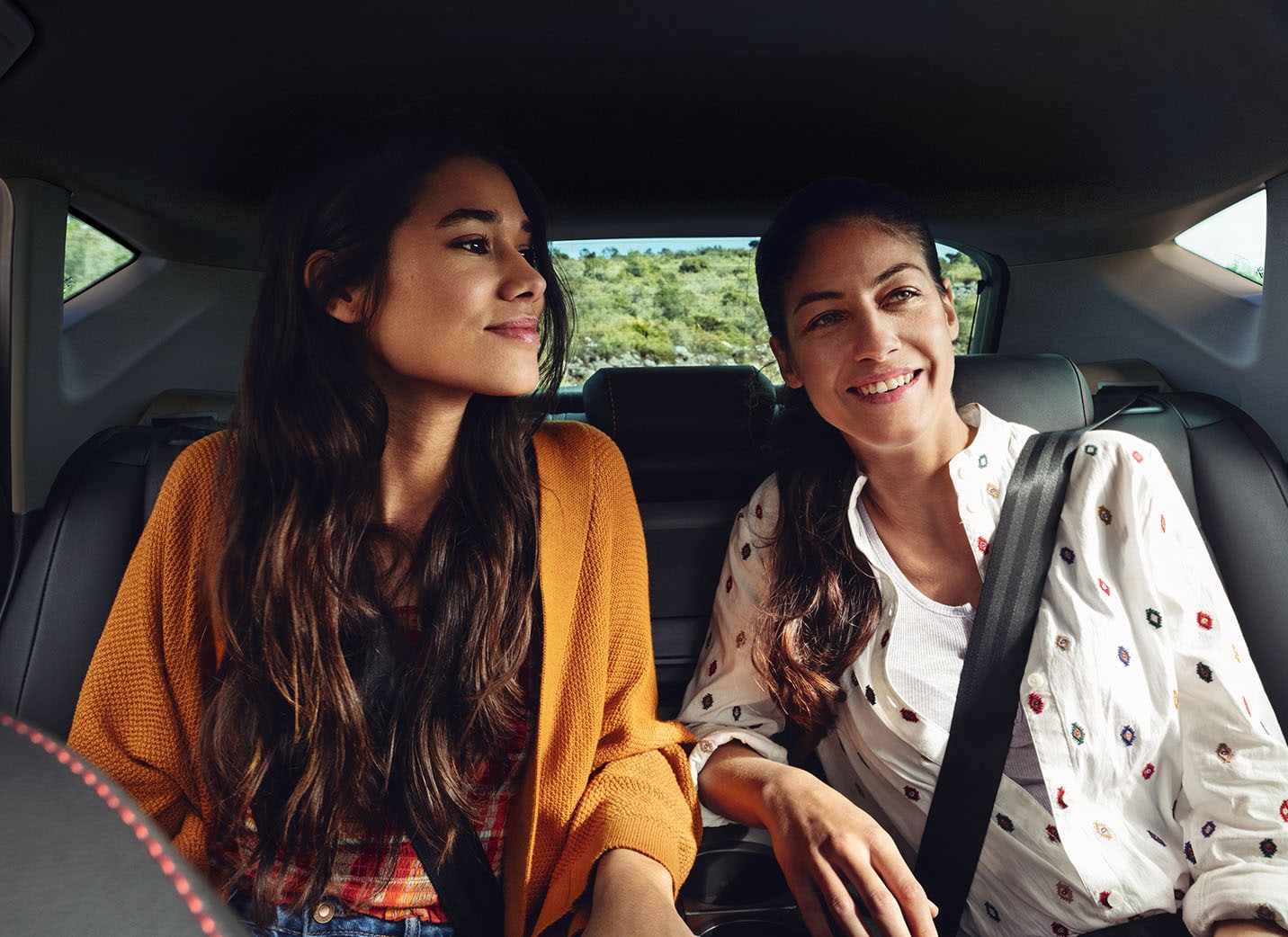 Woman driving a SEAT car 