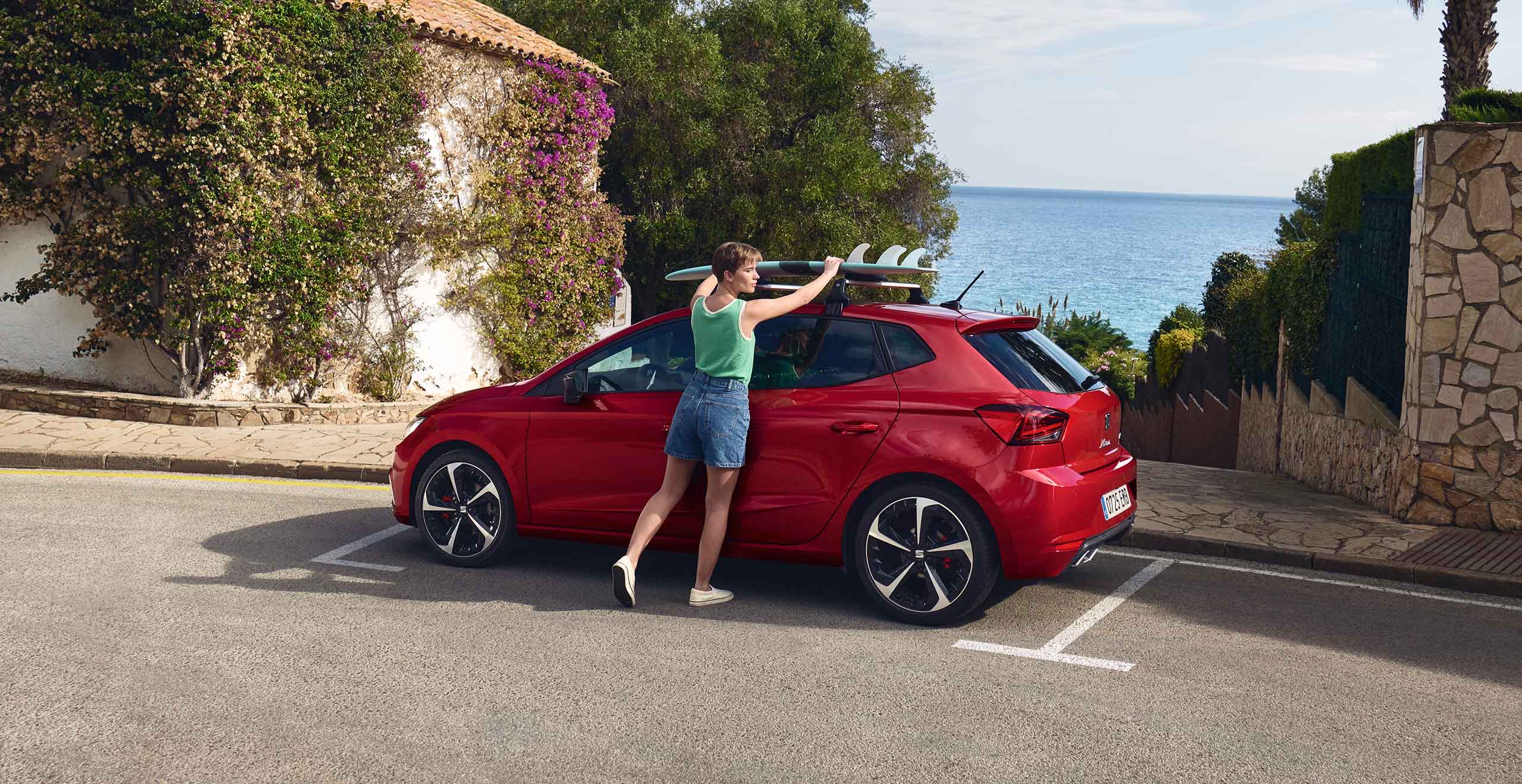 Man on the SEAT Leon talking on the phone.