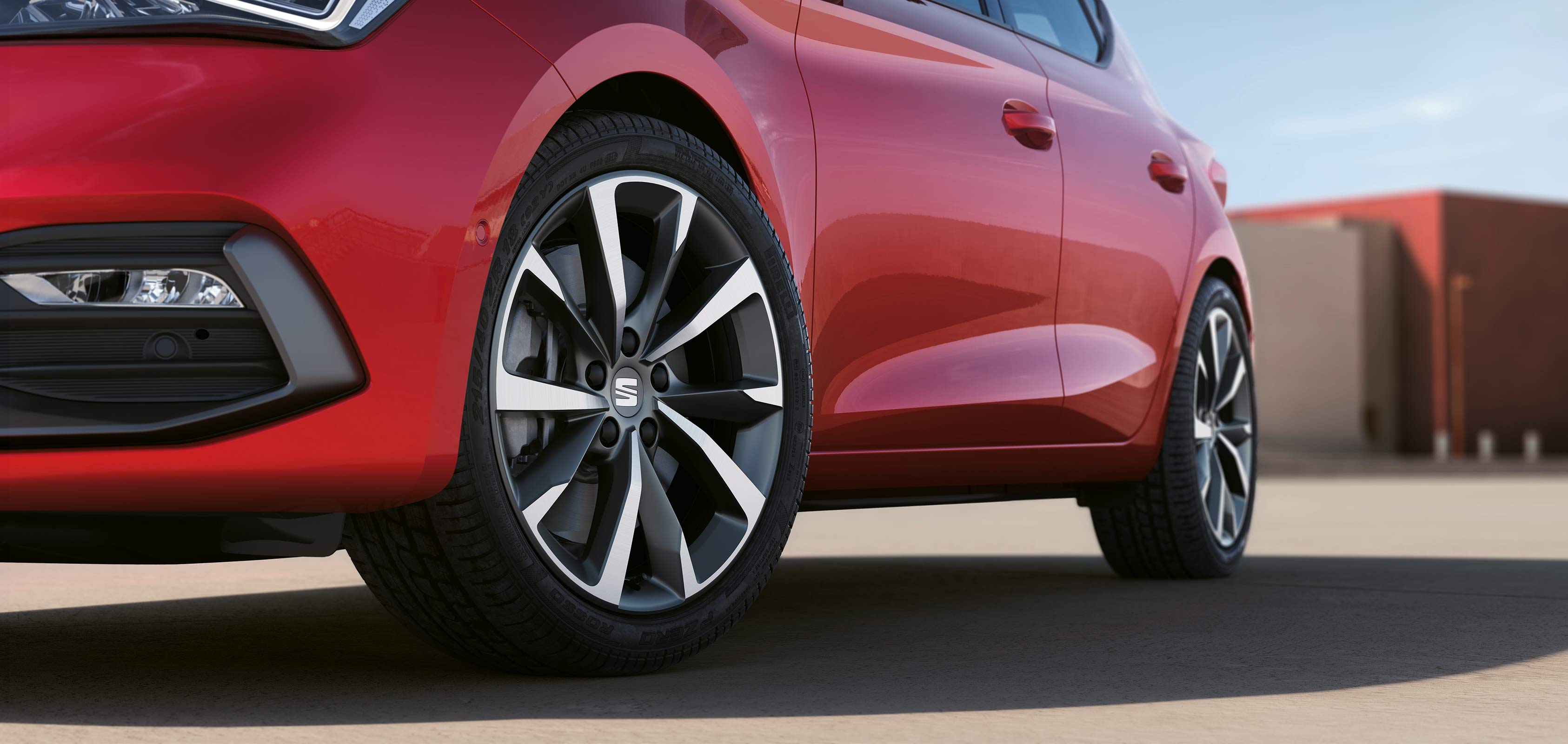 SEAT Leon desire red colour with an exclusive alloy wheel.