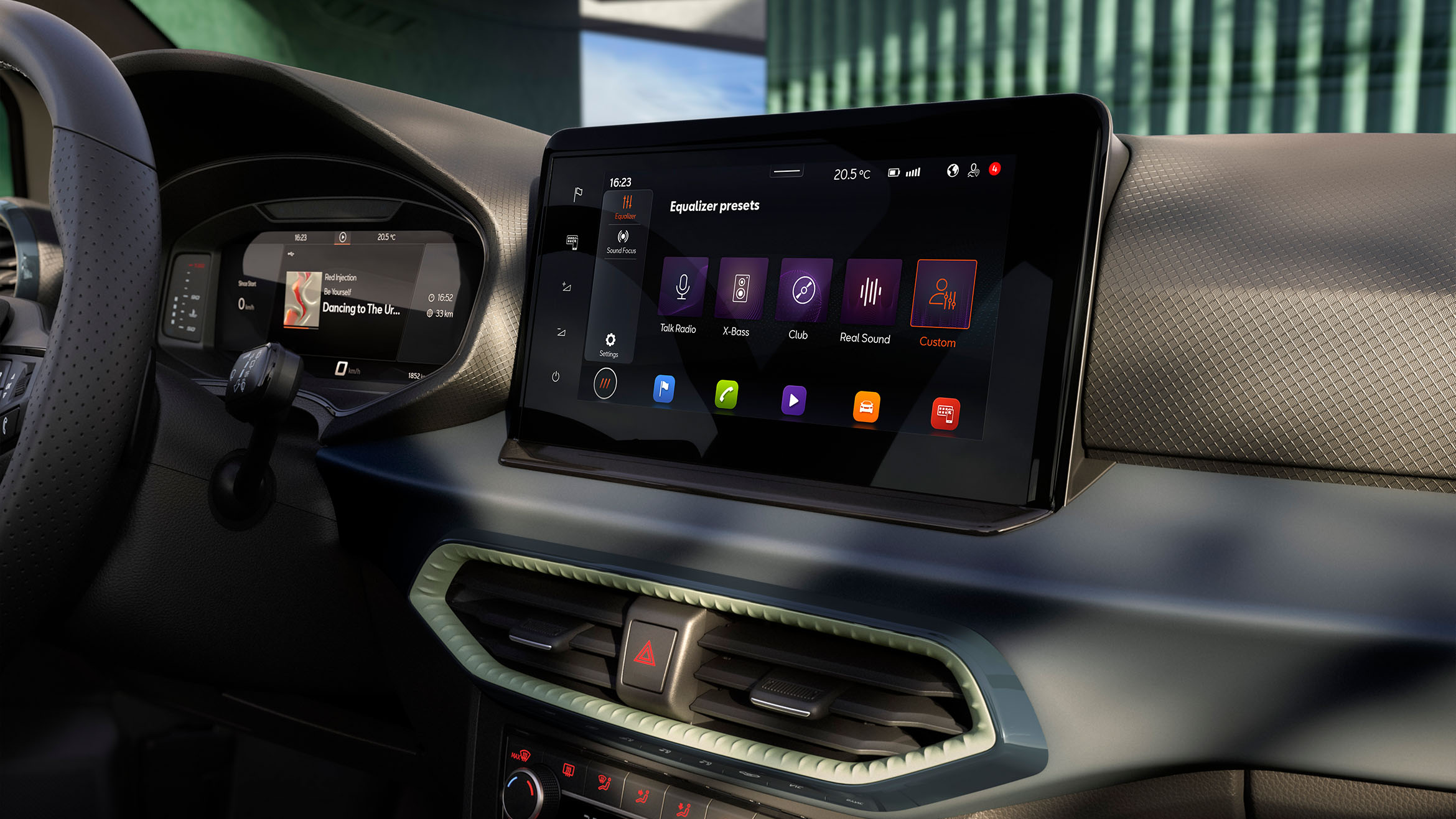 A close-up view of a SEAT Arona dashboard, prominently featuring the central, horizontally mounted digital infotainment touchscreen display with various app icons. The climate control panel and air vents are visible beneath the screen.