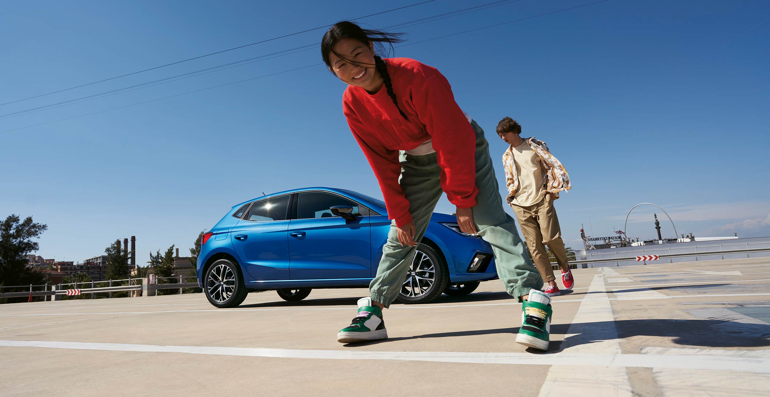 couple-playing-next-to-seat-ibiza
